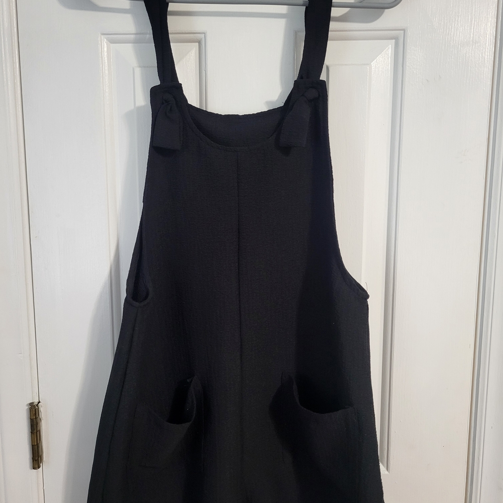 Black Romper With Front Pockets